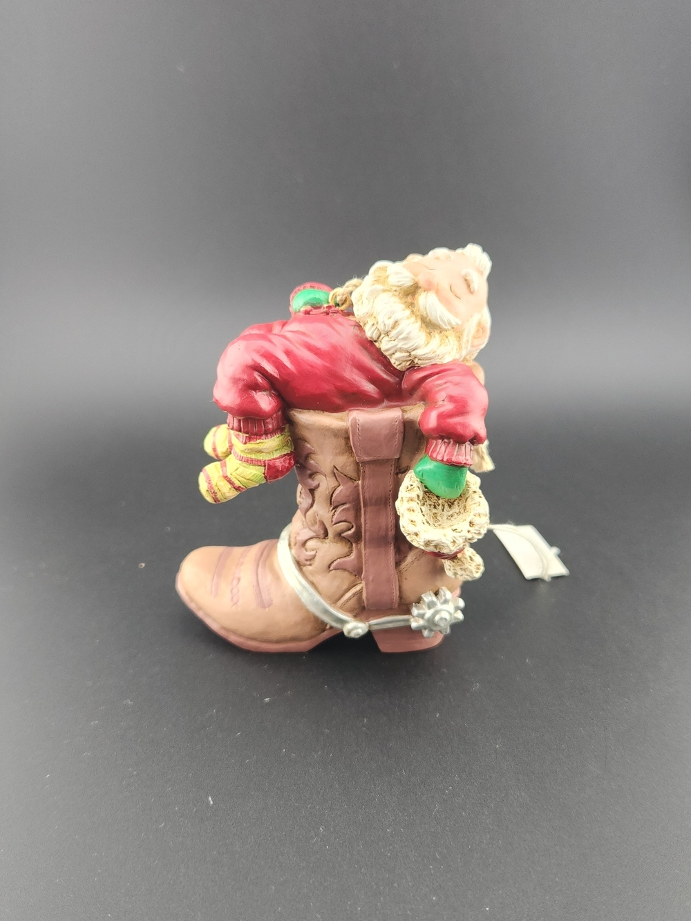 Festive Sleeping Santa Ornament on a Cowboy Boot